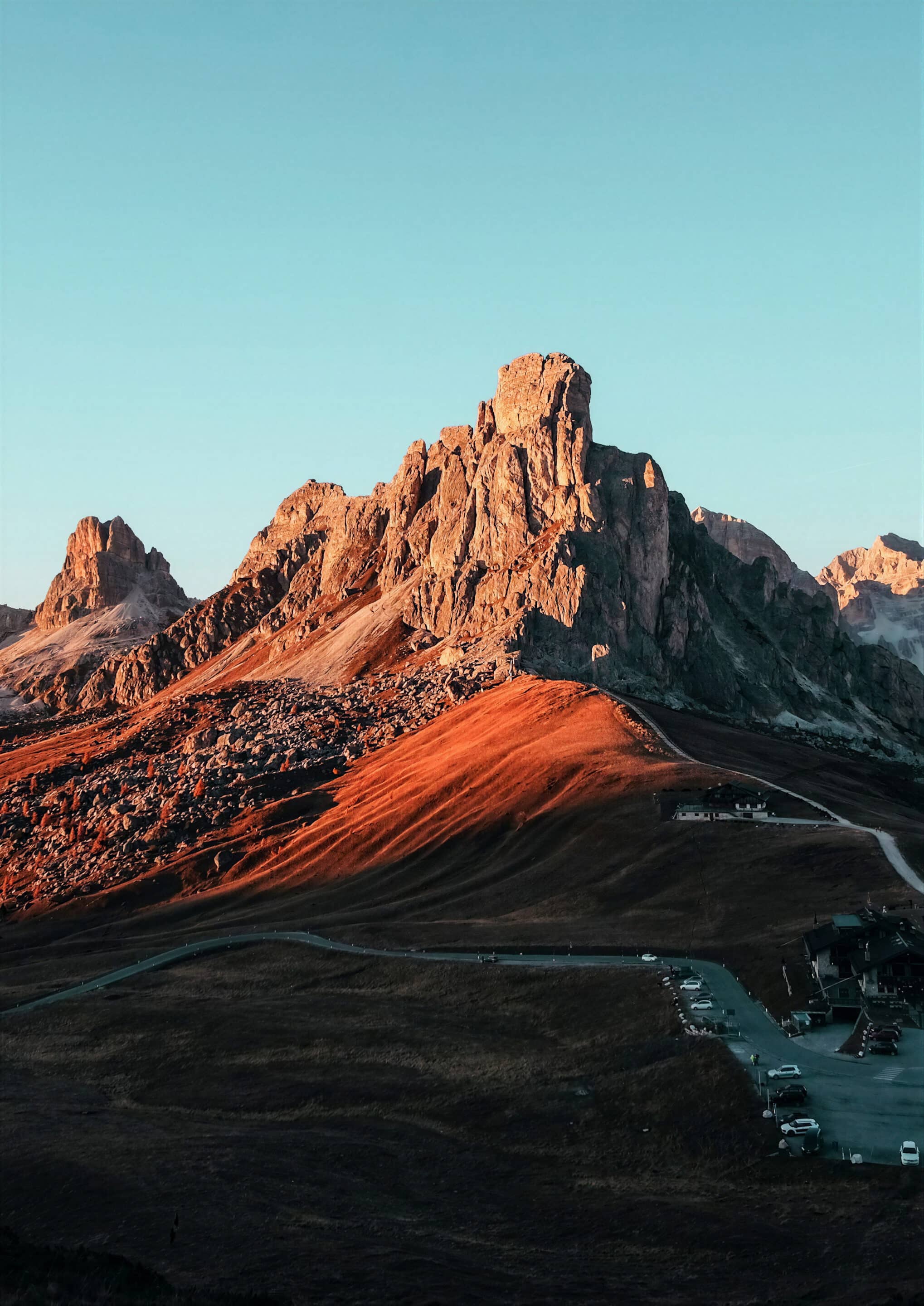 Summit of the Dolomites at sunset above a mountain pass